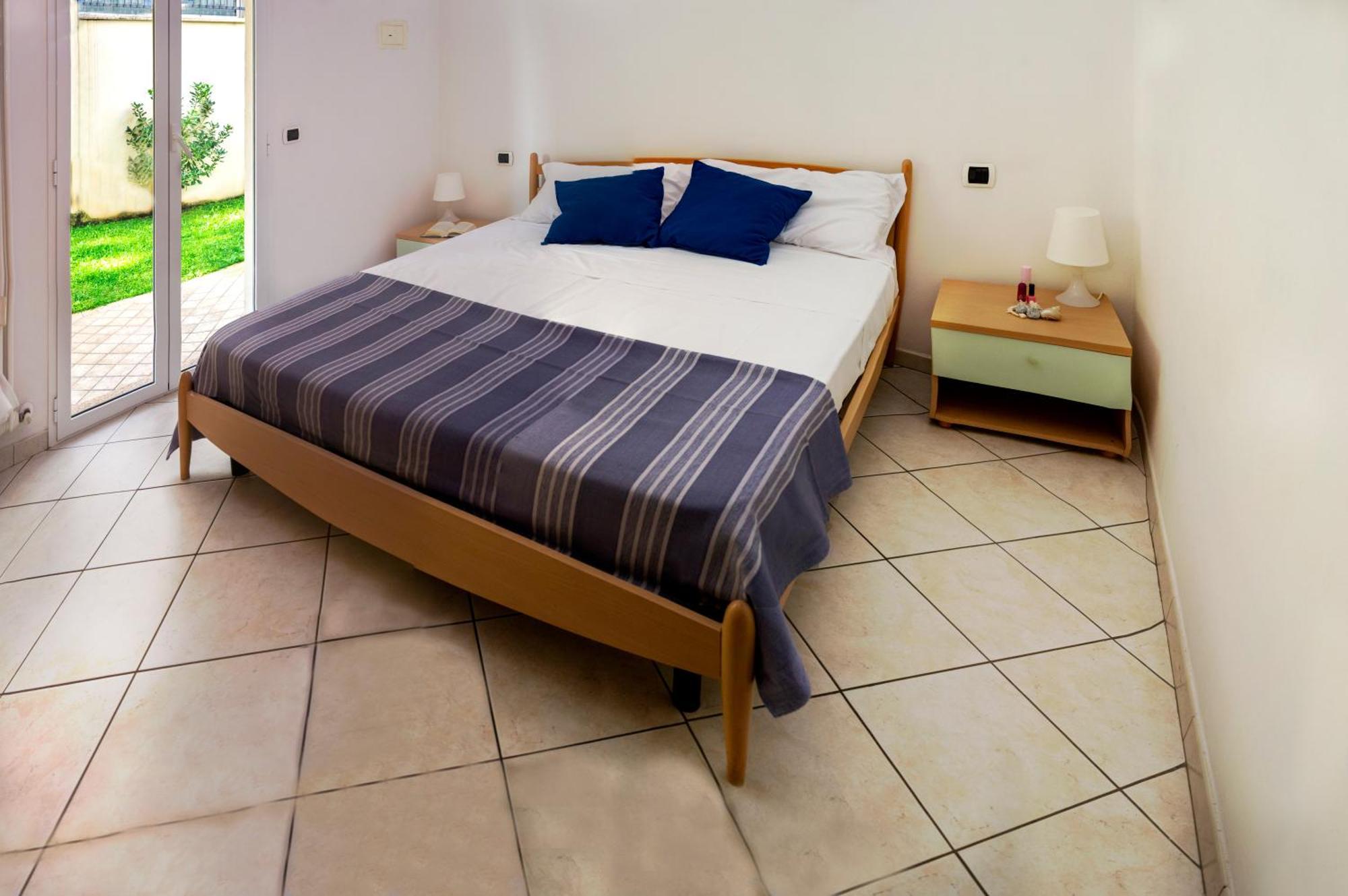 דירות ריצ'יונה Residenza Raggio חדר תמונה